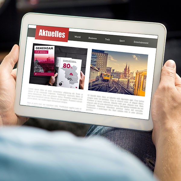 Tablet mit Pressebericht über zweiten Werschöpfungsbericht der Beliner Wohnungsbauunternehmen